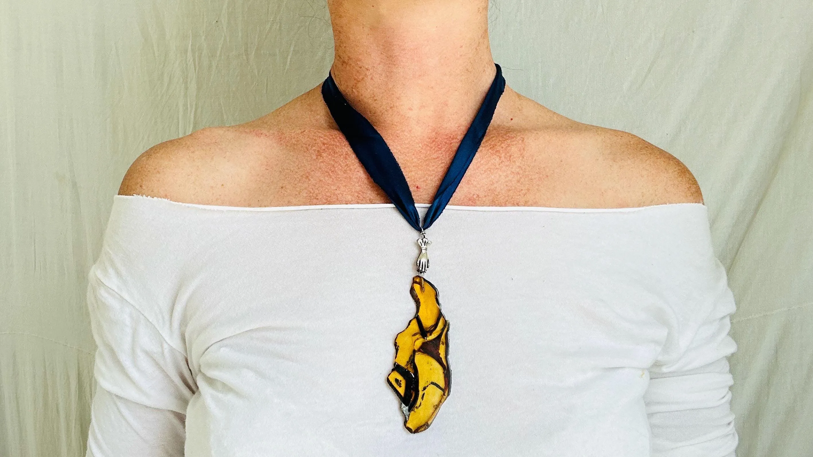 Large Amber Pendant on a Silk Ribbon. 2422