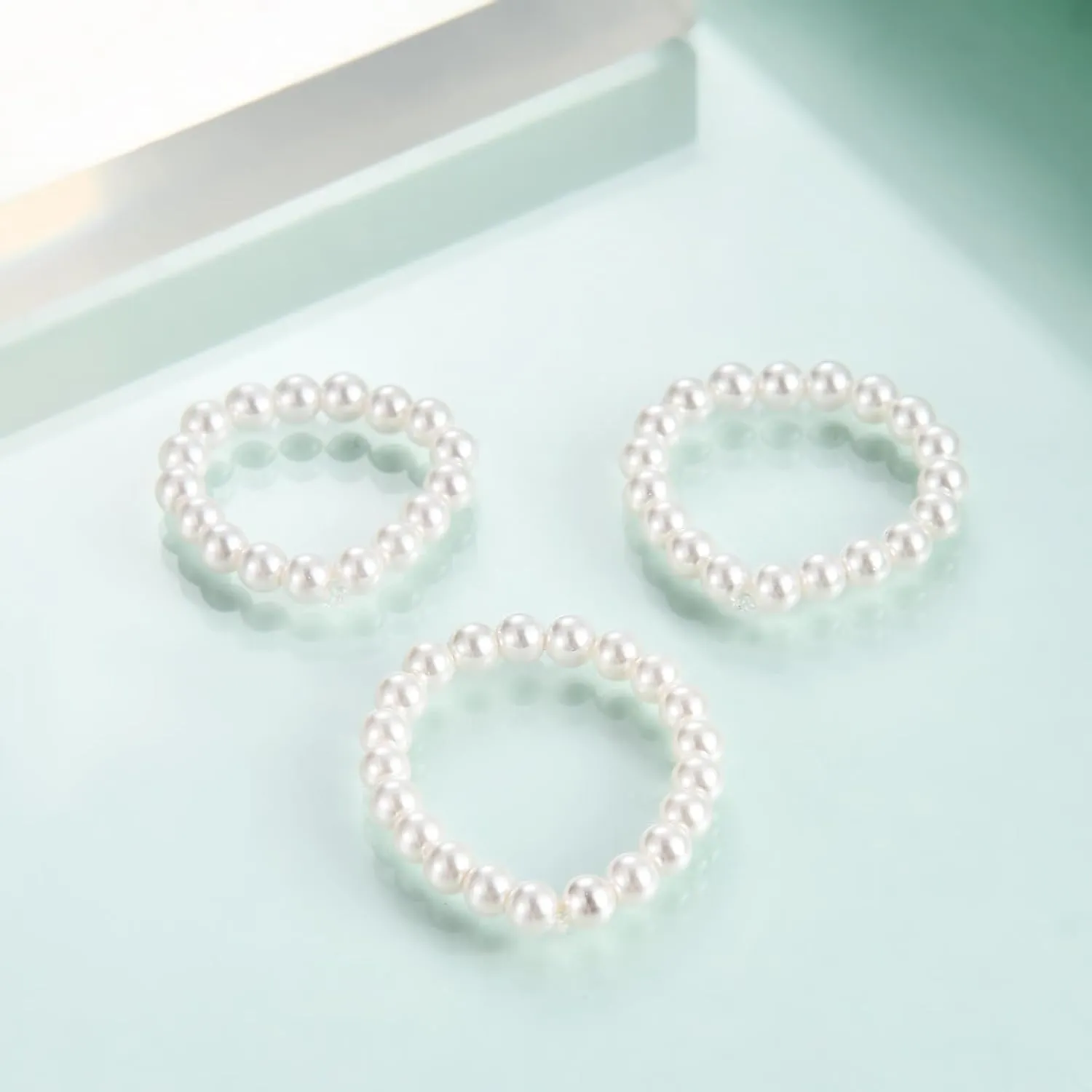 Rnivida 3Pcs Stretch Pearl Rings for Women,Faux Pearl Ring Strand 3MM Stackable Rings Adjustable Size